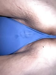 A voluptuous curvy homemaker adorned in a azure nightdress.