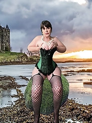 Skillful chubby mama is posing naked for fun