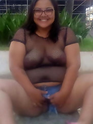 Sensual plump businesswoman puts on hot panties